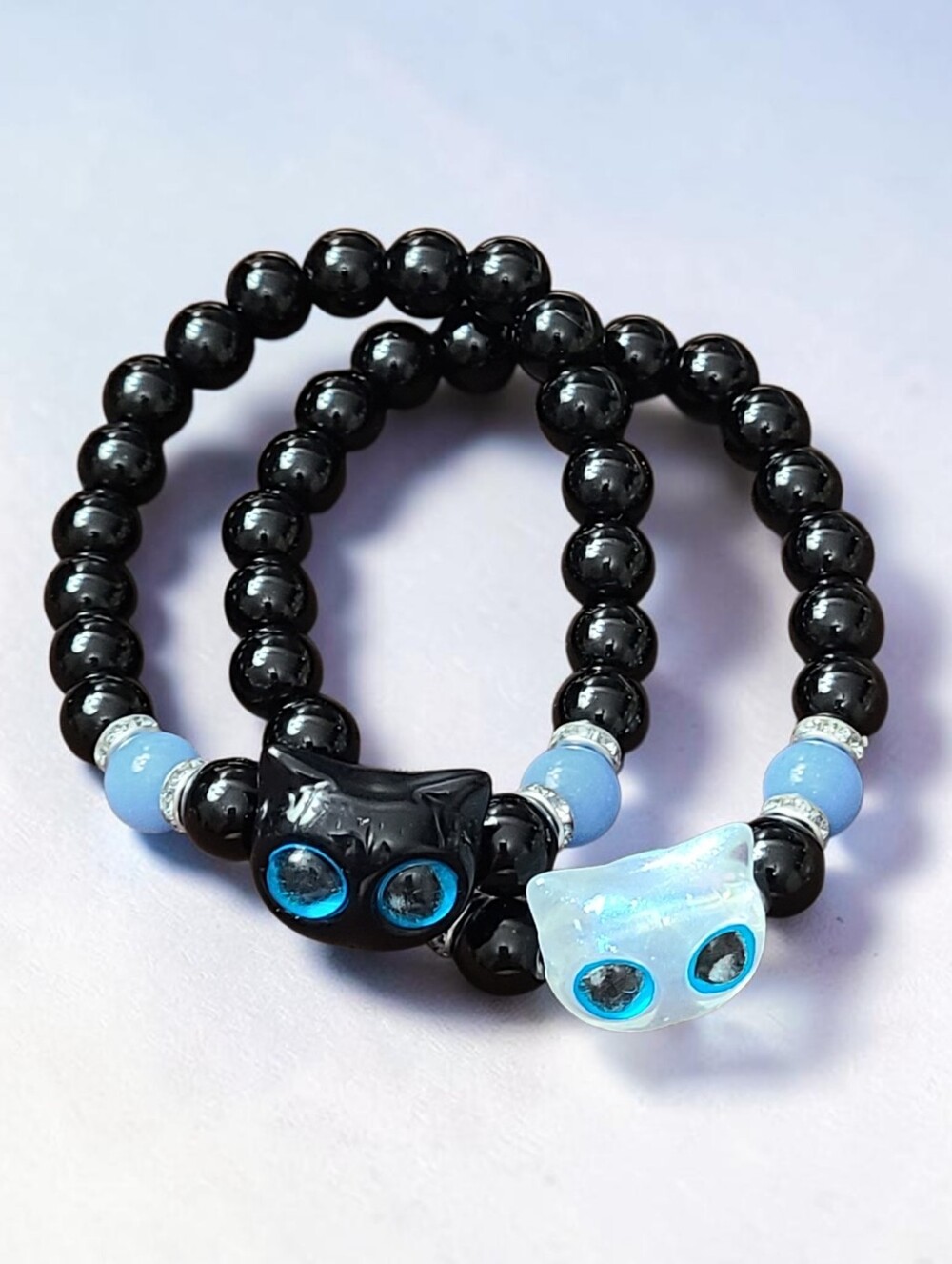 Black Beaded Cat Bracelet with Light Blue Accents